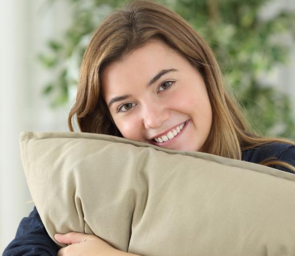 person with pillow