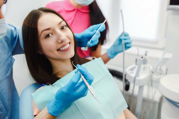 Woman at dental hygiene appointment